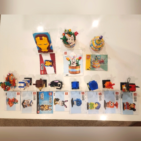 lot of 11 build with manual , sketchers, brick headz, inside